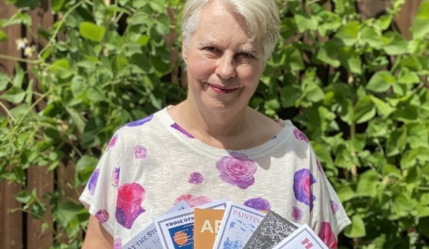 camilla reeve holding books