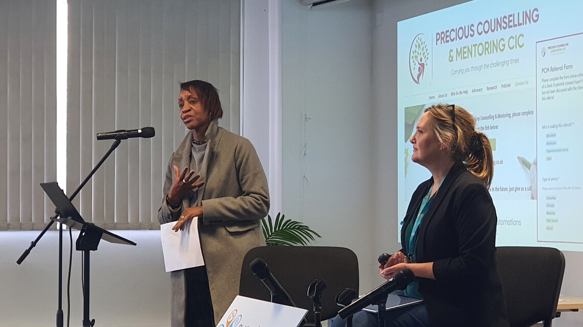 mauva from precious counselling and mentoring discussing superhighways' support with CRM at conference