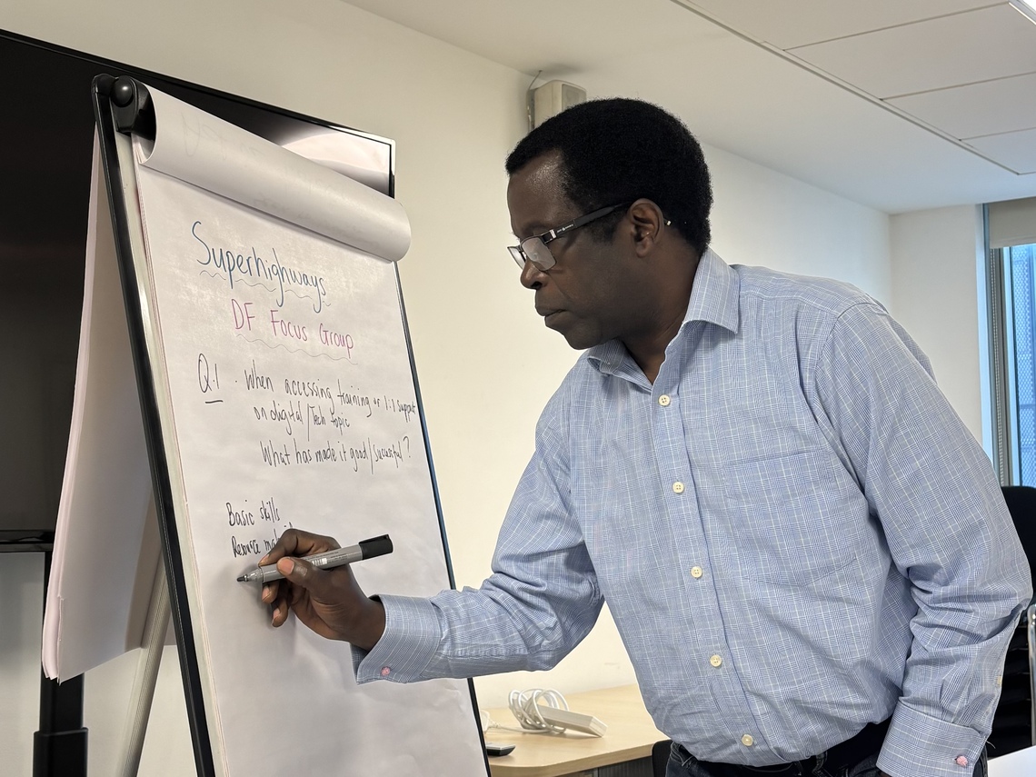 ezechias writing on a flipchart