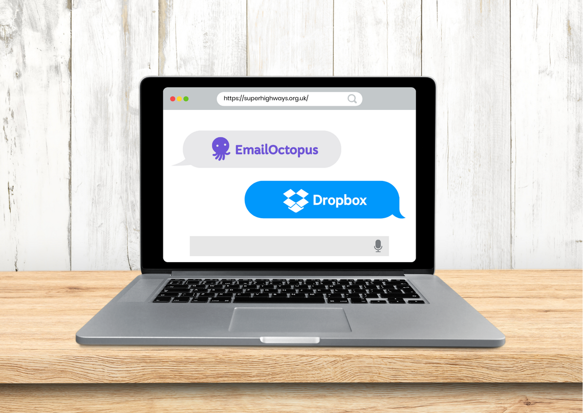 laptop on messaging screen with octopus email and dropbox logos